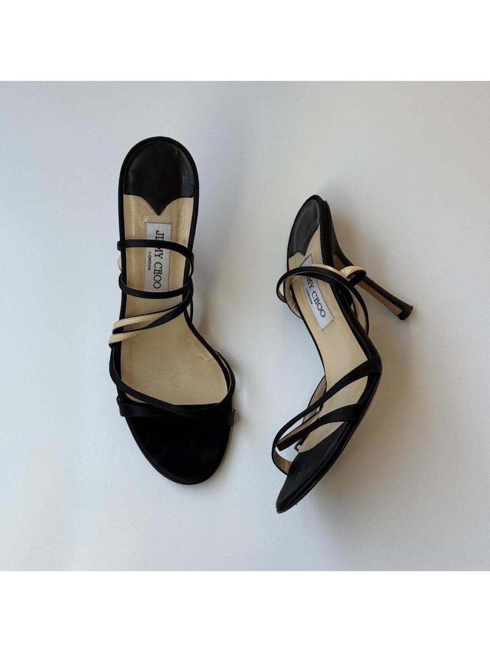 Jimmy Choo satin strappy heels in black. Delicate wraparound straps